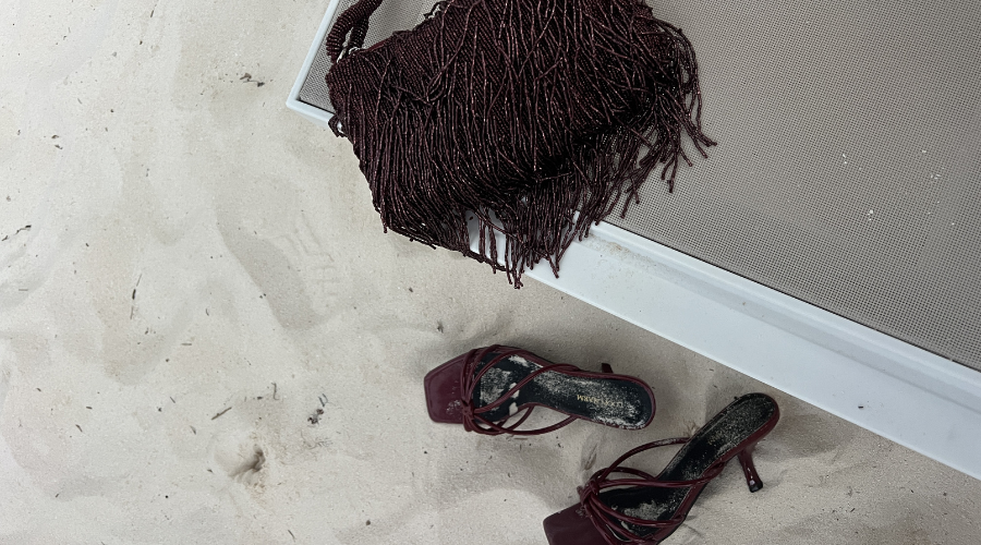 A pair of heels on sand